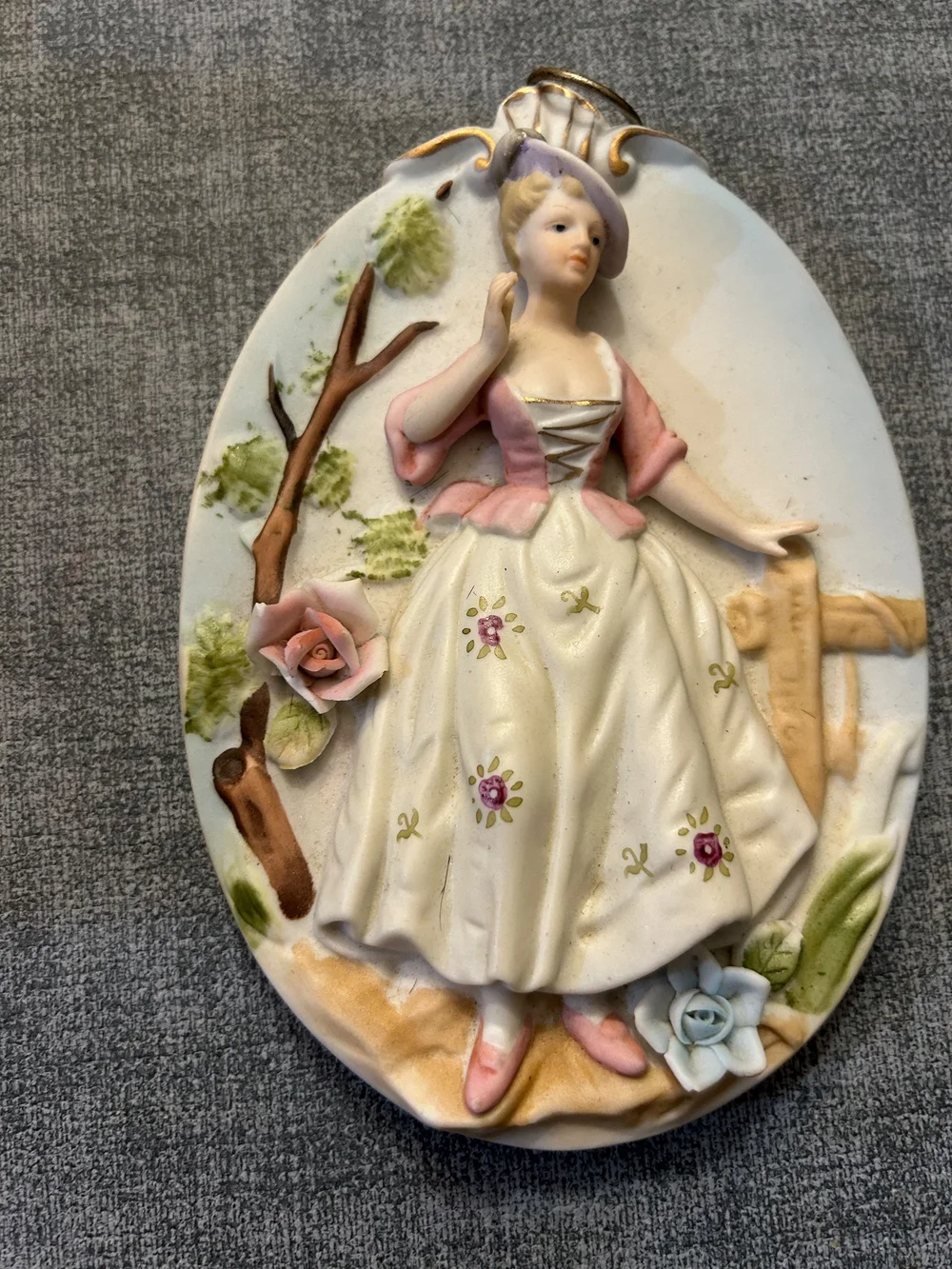 vintage 3D ceramic wall plaques, likely made by Lipper & Mann